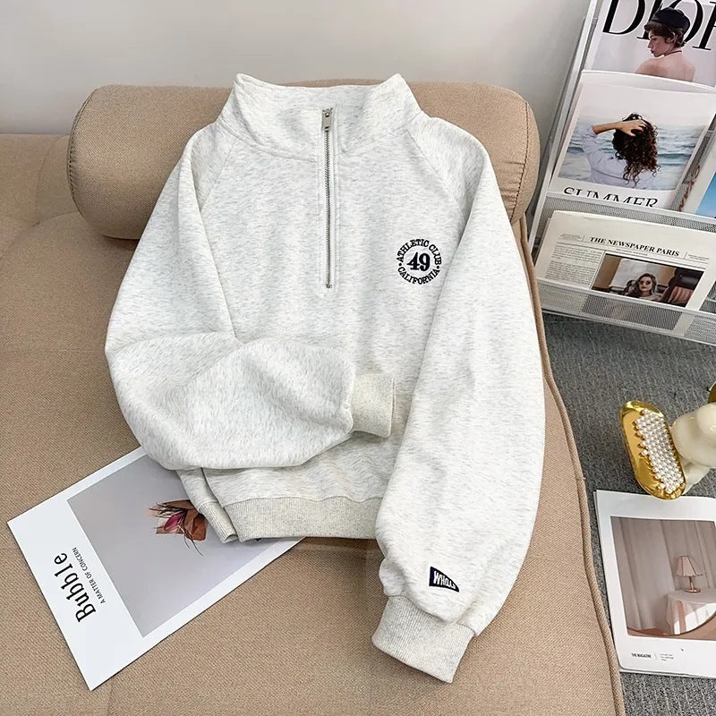 Pullover mit Stehkragen und halbem Reißverschluss